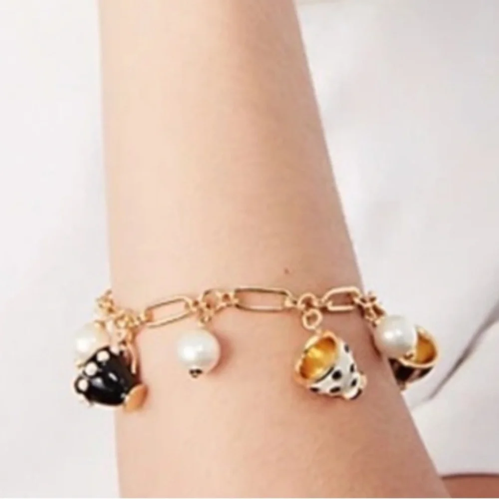Kate Spade alice in wonderland teacup charm bracelet - Picture 5 of 5